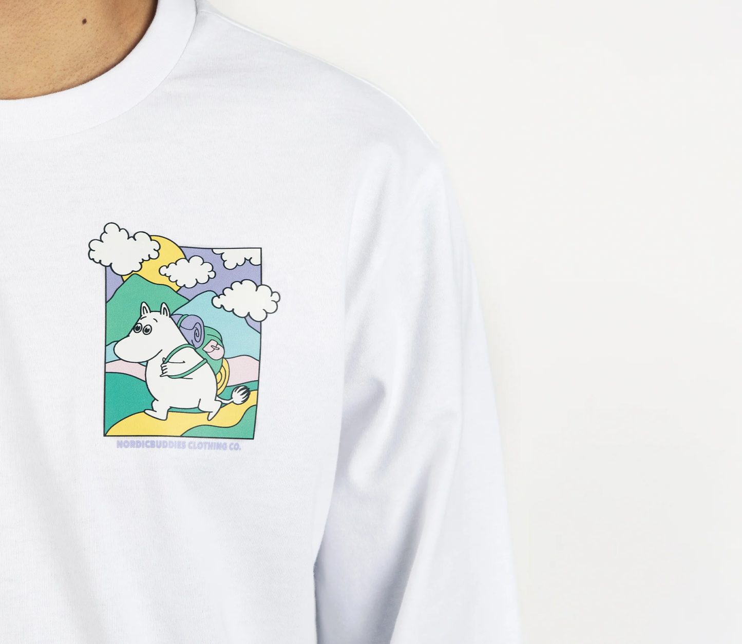 Moomintroll adventure long sleeves t-shirt featuring a playful design of Moomintroll in a whimsical landscape