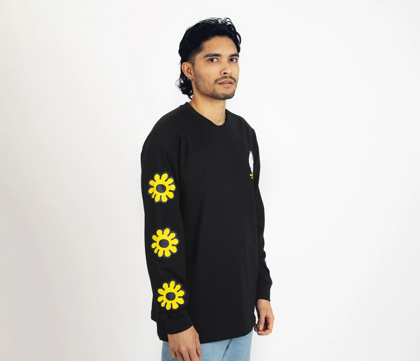 Moomintroll flower long sleeve shirt in black with yellow flower designs on sleeves