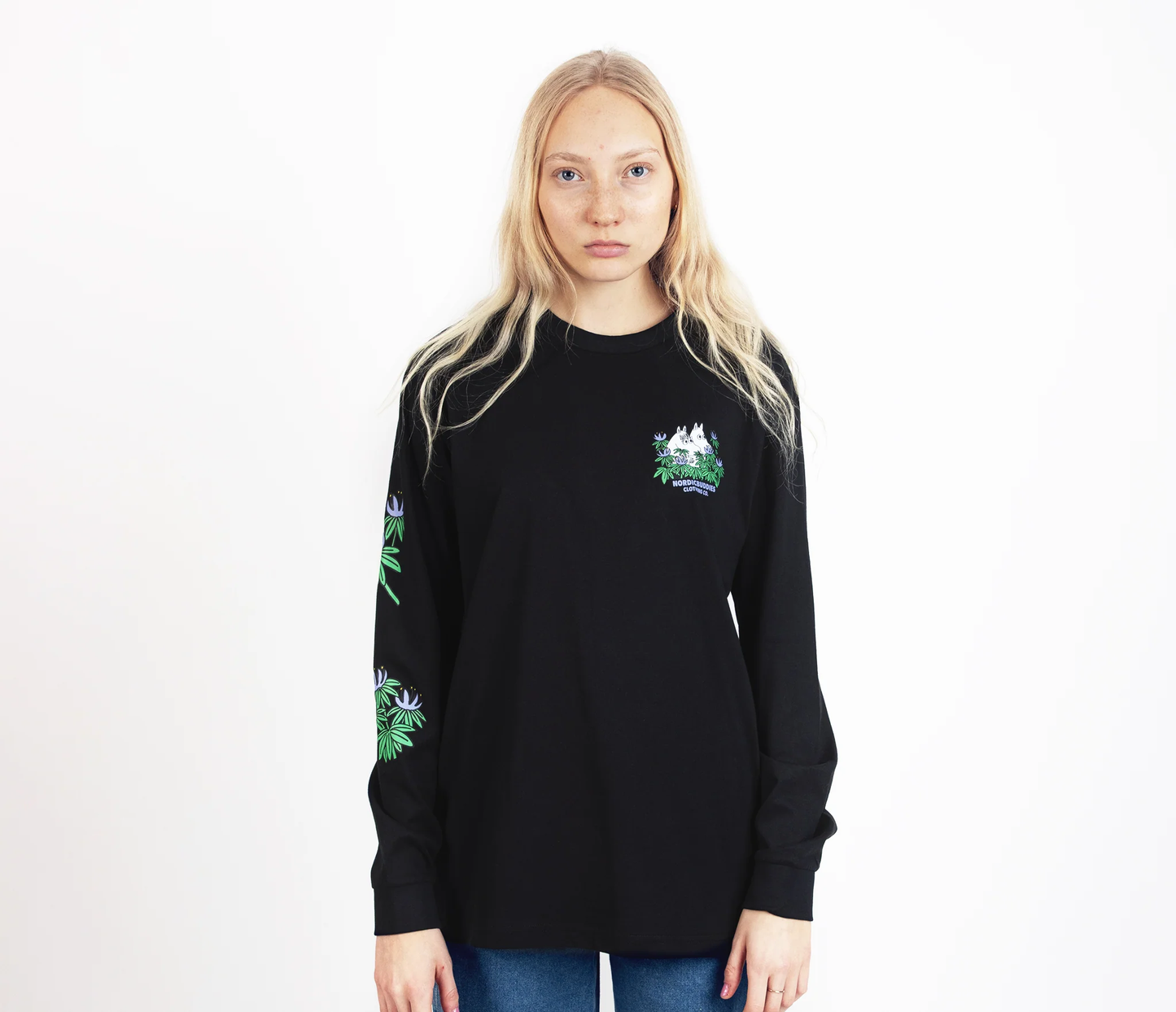 Black hide and seek long sleeves moomintroll t-shirt by Moomin featuring small colorful graphic on chest and sleeve
