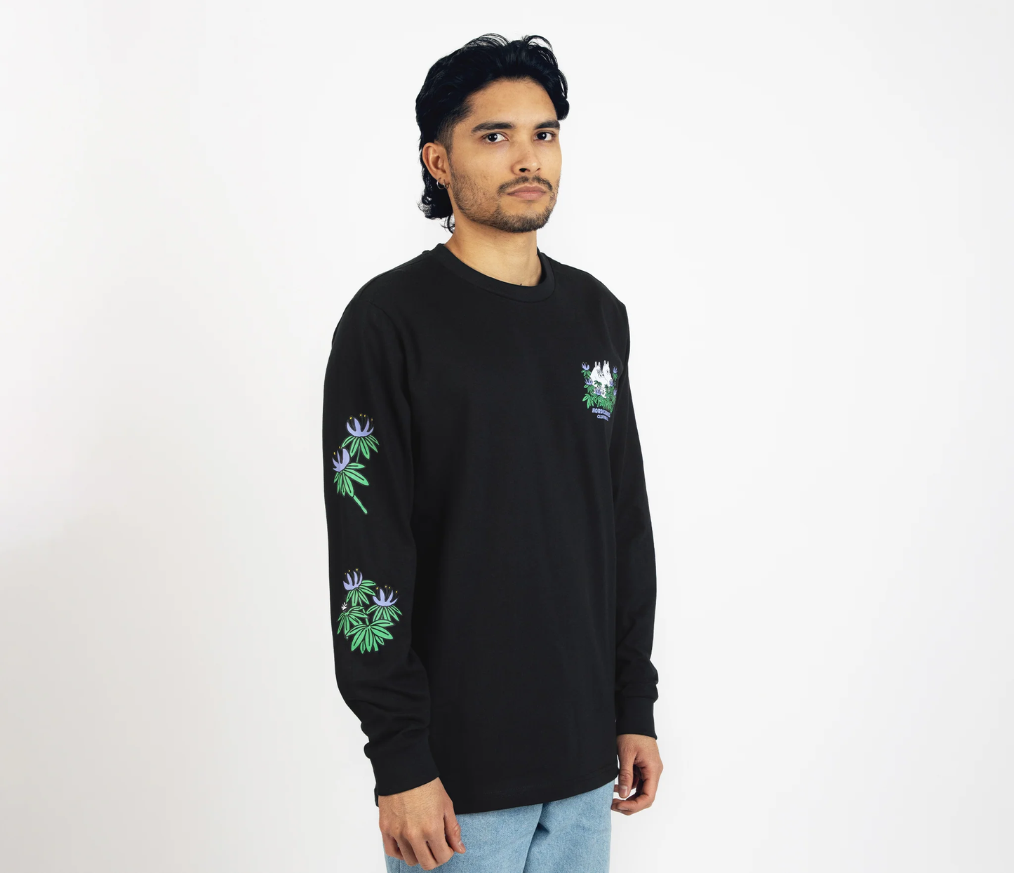 Black hide and seek long sleeves moomintroll t-shirt with floral designs worn by male model