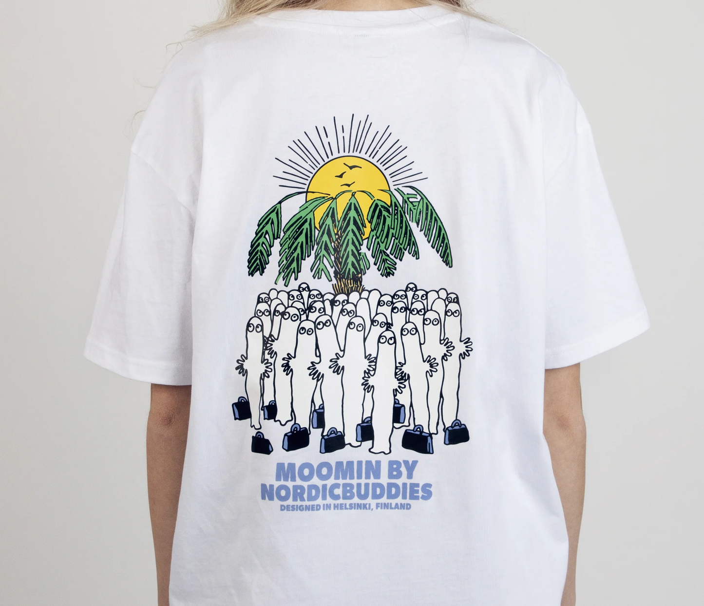 White surf trip t-shirt by Moomin by NordicBuddies featuring a colorful graphic design on the back