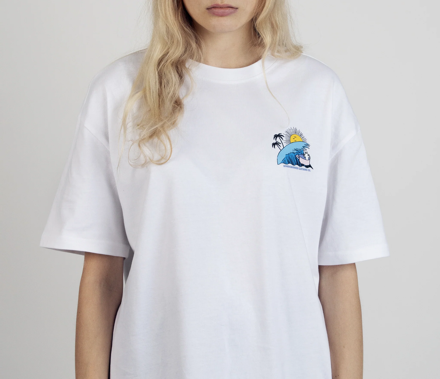 Moomin by NordicBuddies white surf trip t-shirt featuring a colorful wave and sun design