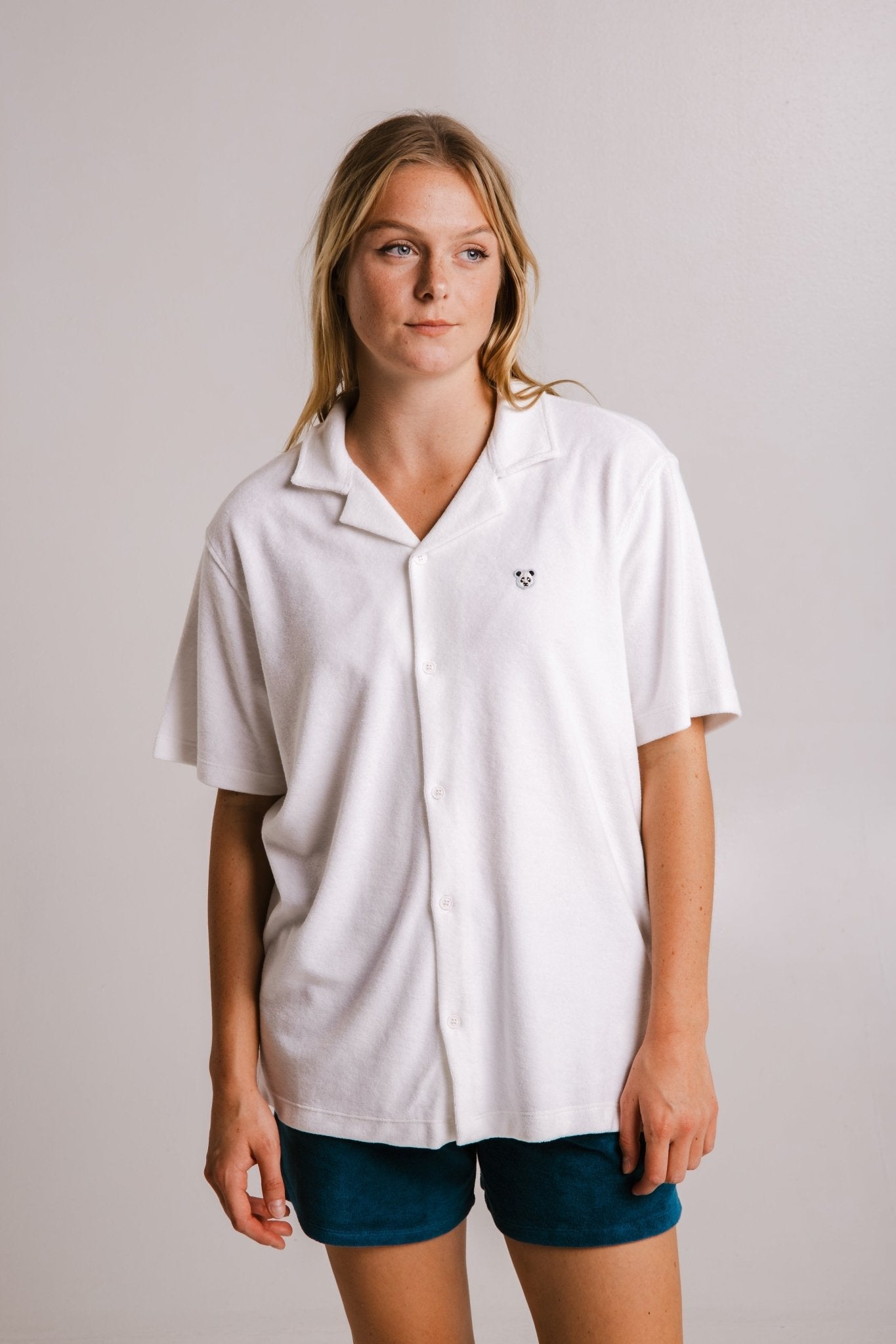 Sossu panda terry t-shirt white button-up shirt with short sleeves worn by woman