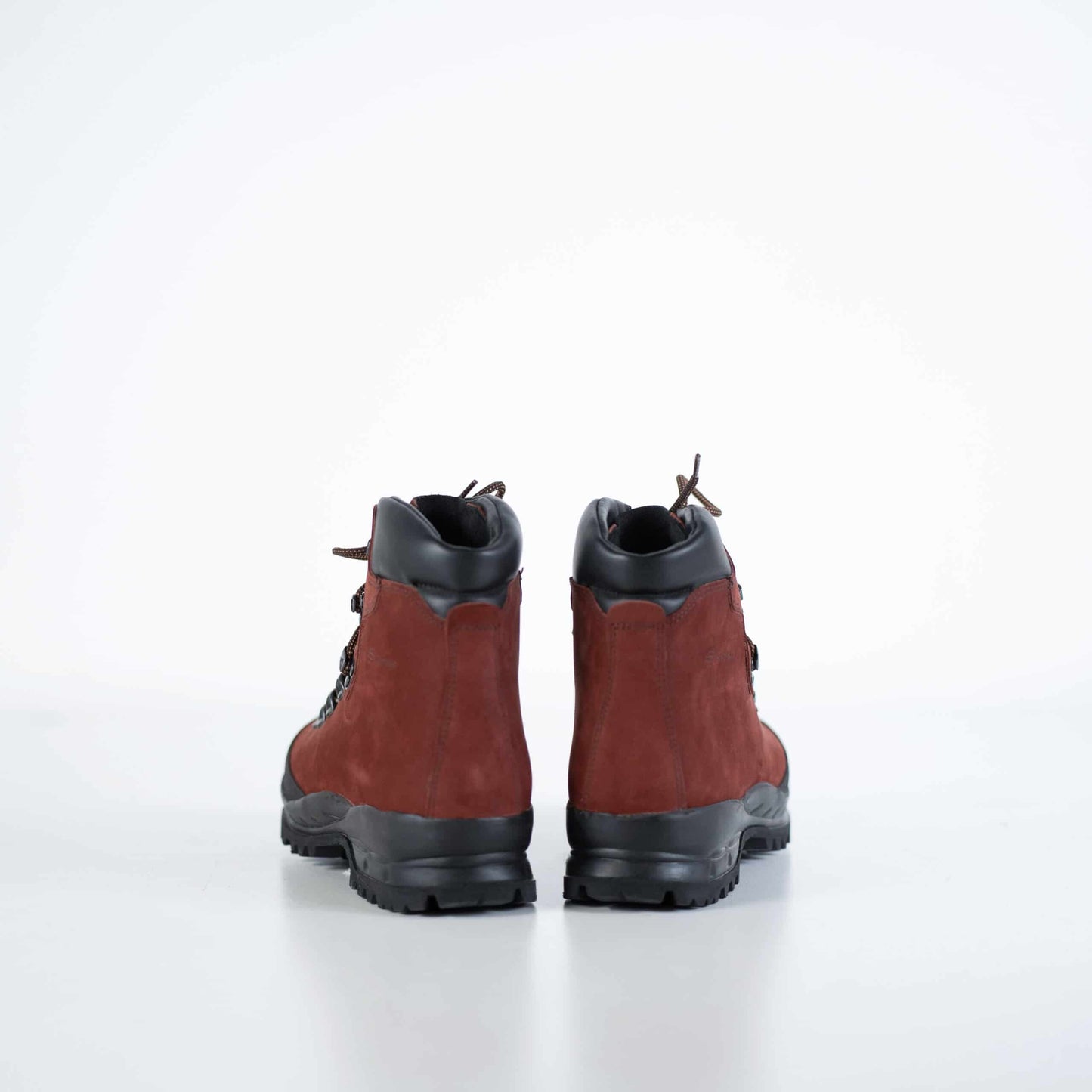 Samelin red hiking boots waterproof hiking boots shown from the back with black soles and ankle support