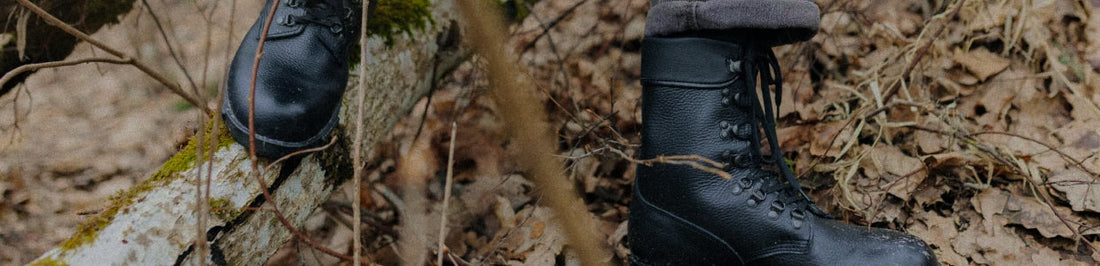 Durable M77 military boots for everyday wear showcased in a natural outdoor setting