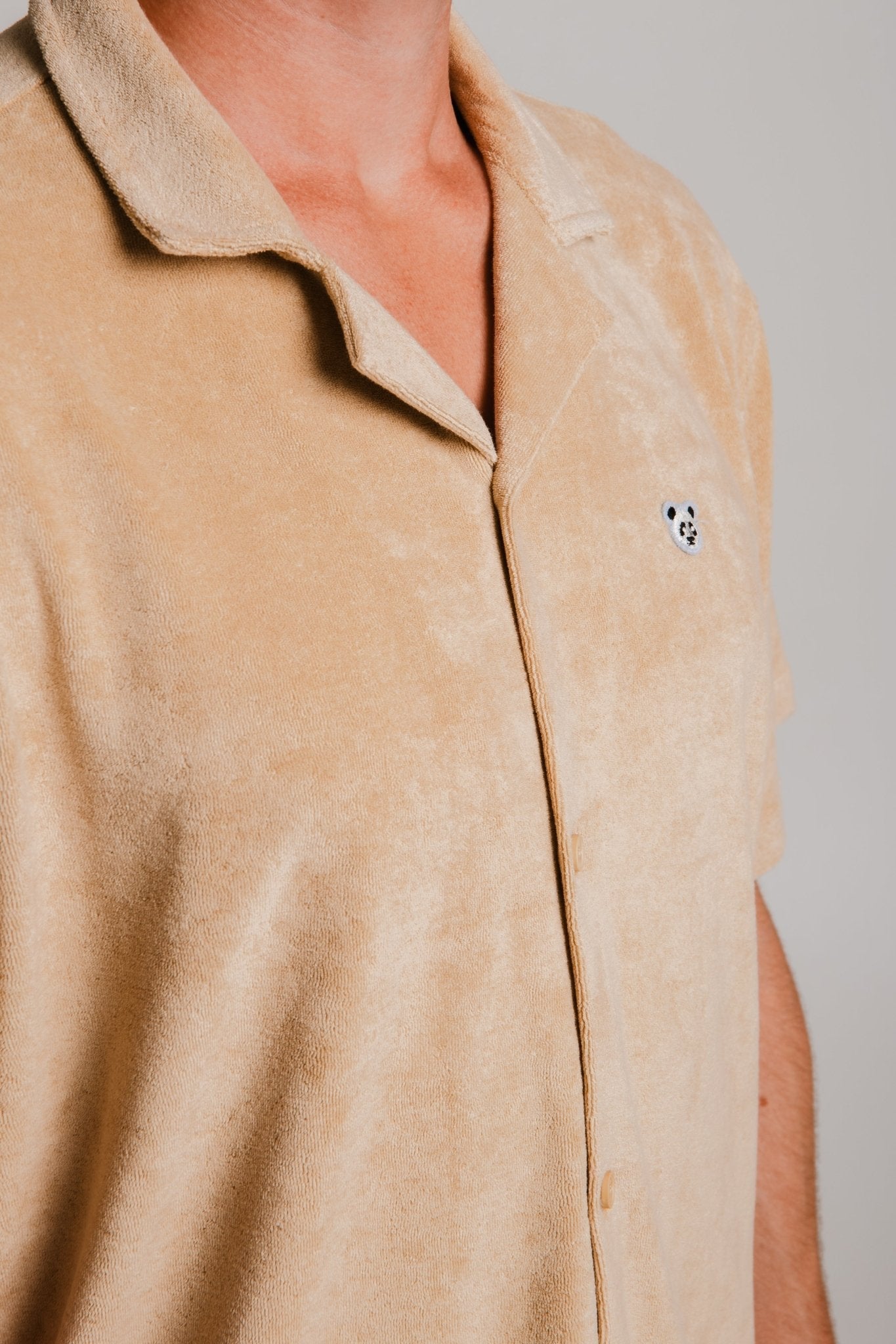Sossu light brown panda t-shirt with soft fabric and small panda logo on chest