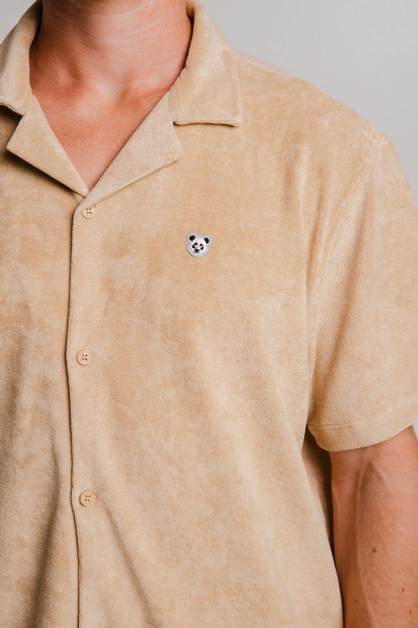 Sossu light brown panda t-shirt with short sleeves and small panda logo on chest
