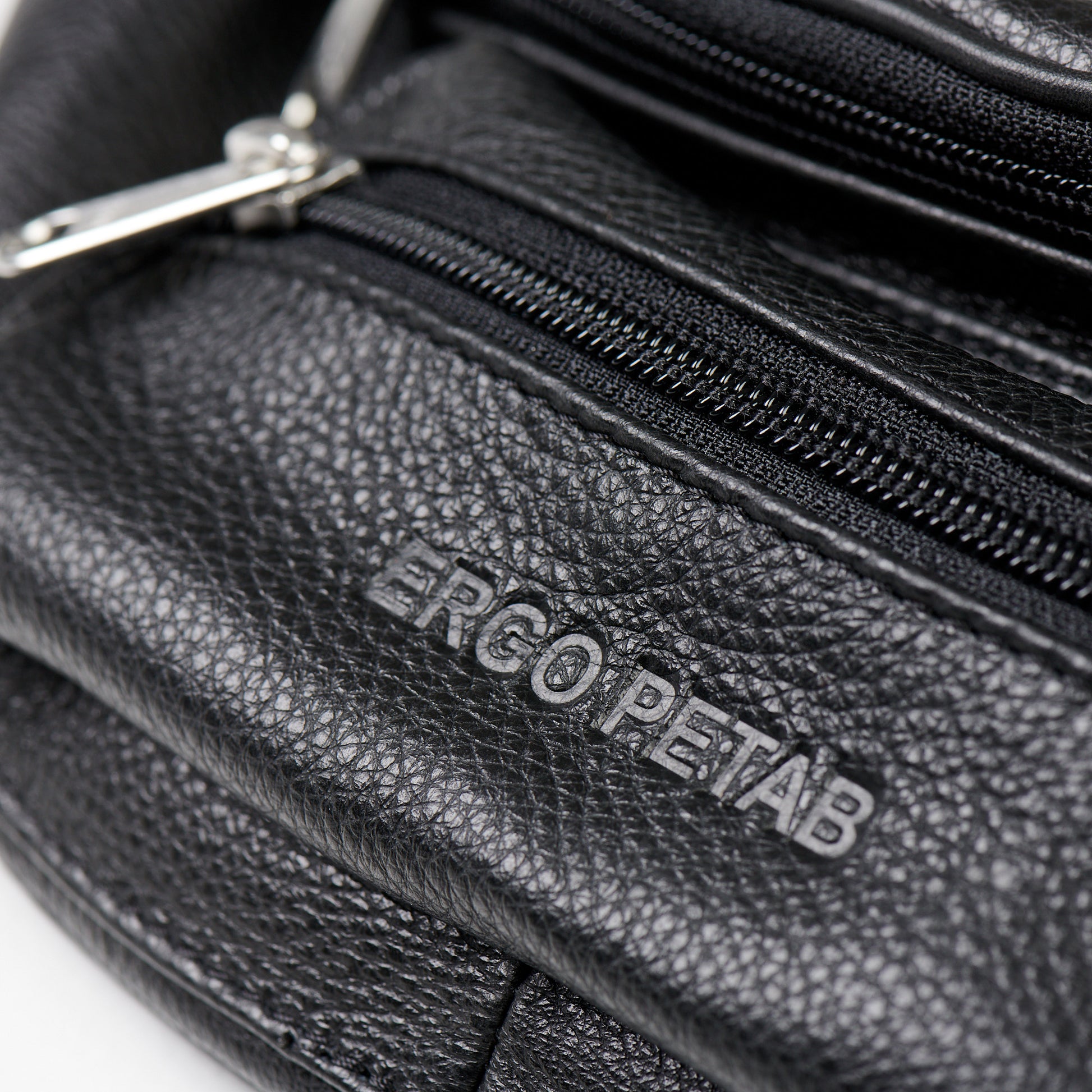 Jeekim leather waist bag for travel with multiple zippered compartments in sleek black design