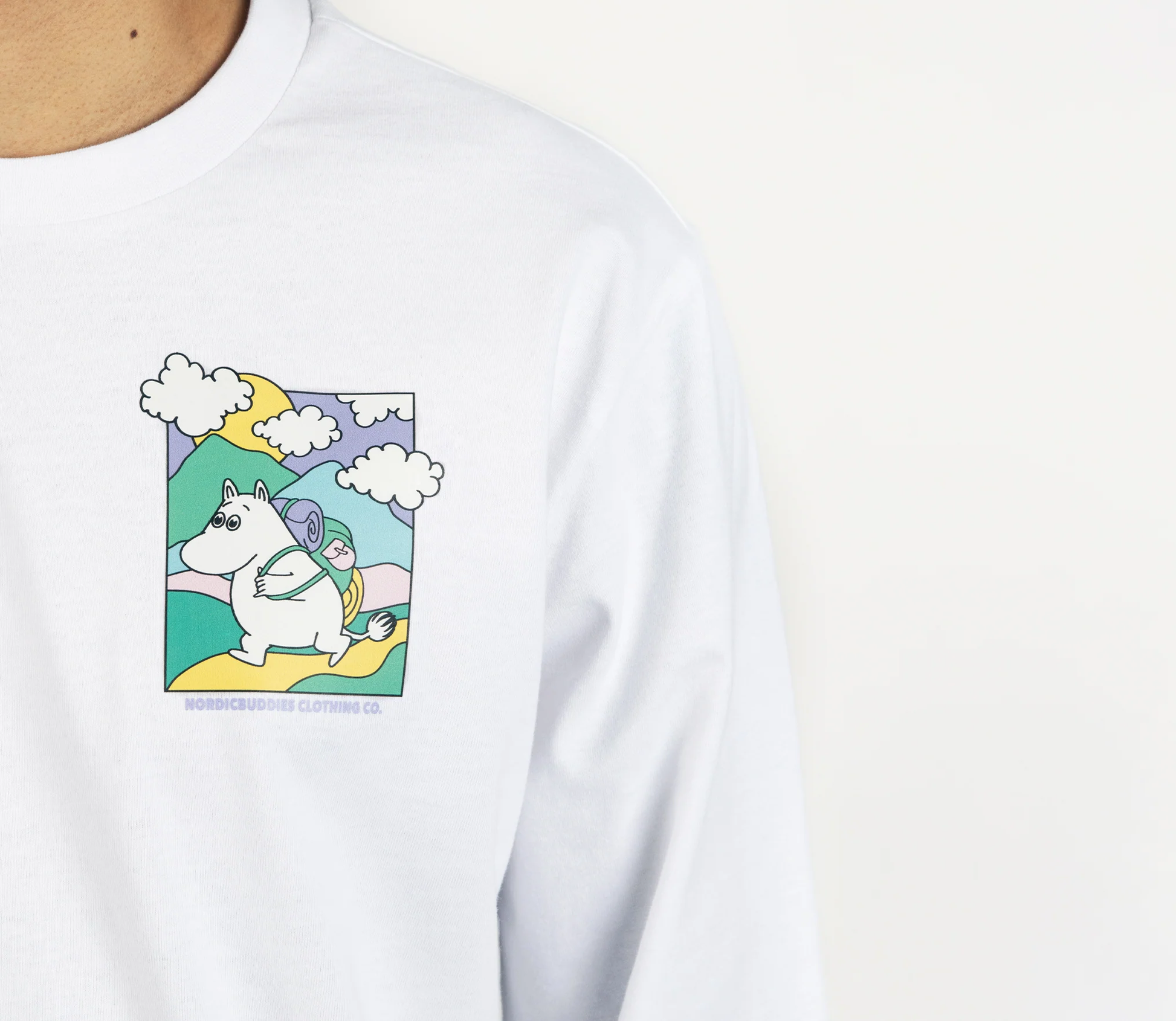 Moomintroll adventure long sleeves t-shirt featuring a playful design of Moomintroll in a whimsical landscape